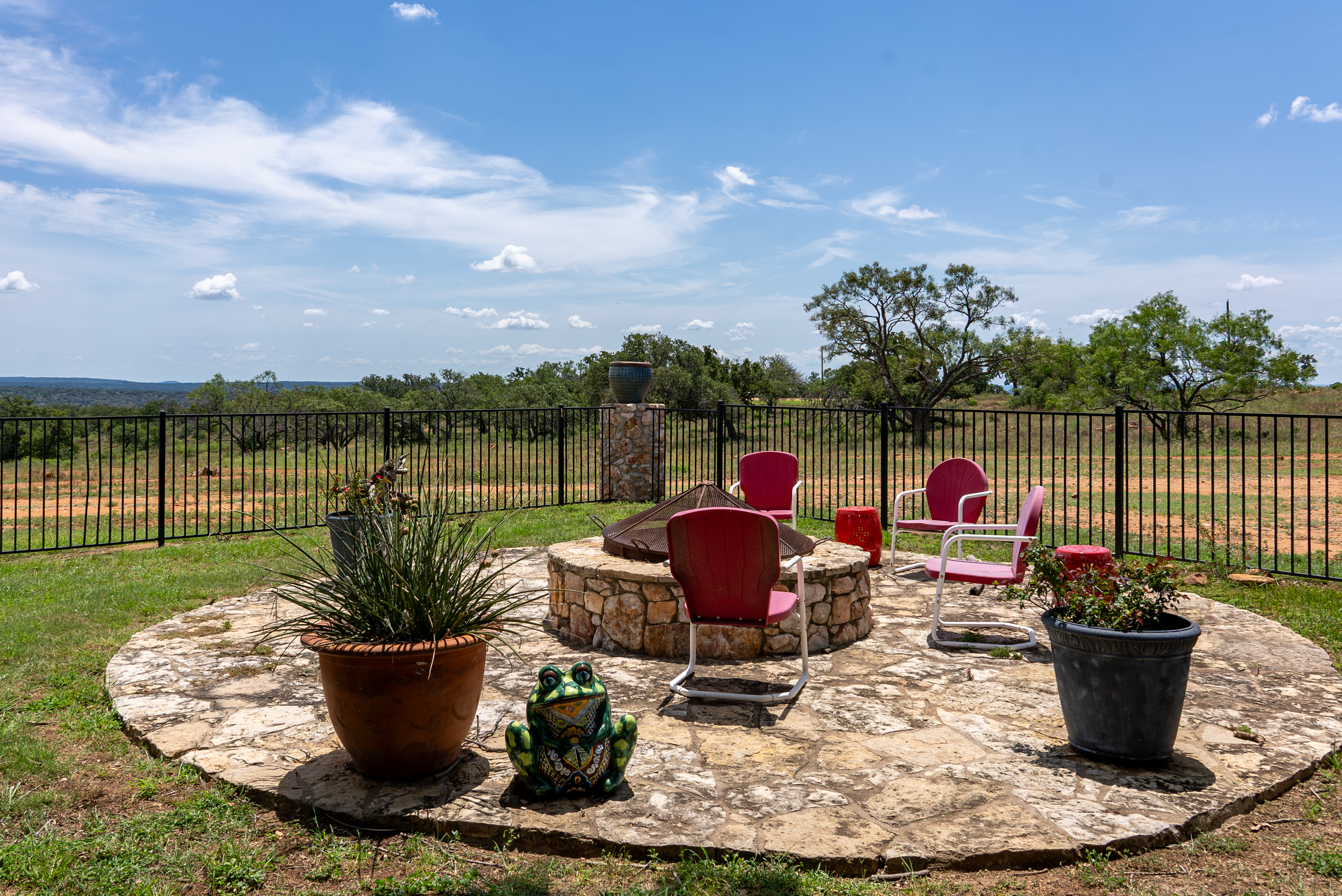 Llano hunting lodge firepit with hill county views